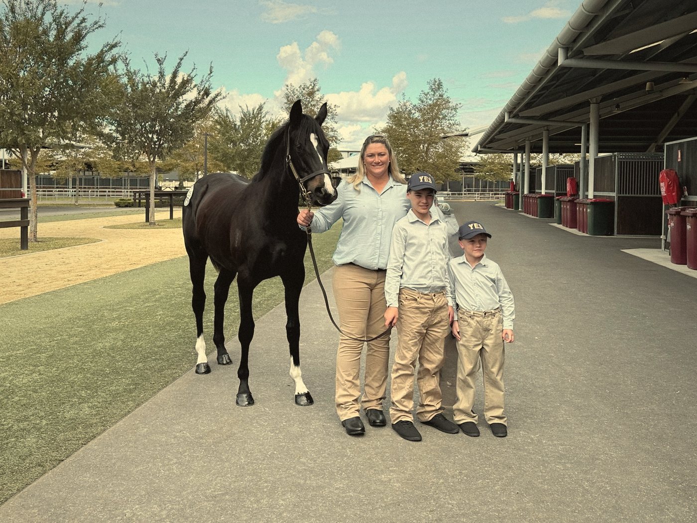 The McNamara family with their black yearling at the Inglis sales